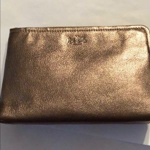 New Coach gold metallic wristlet